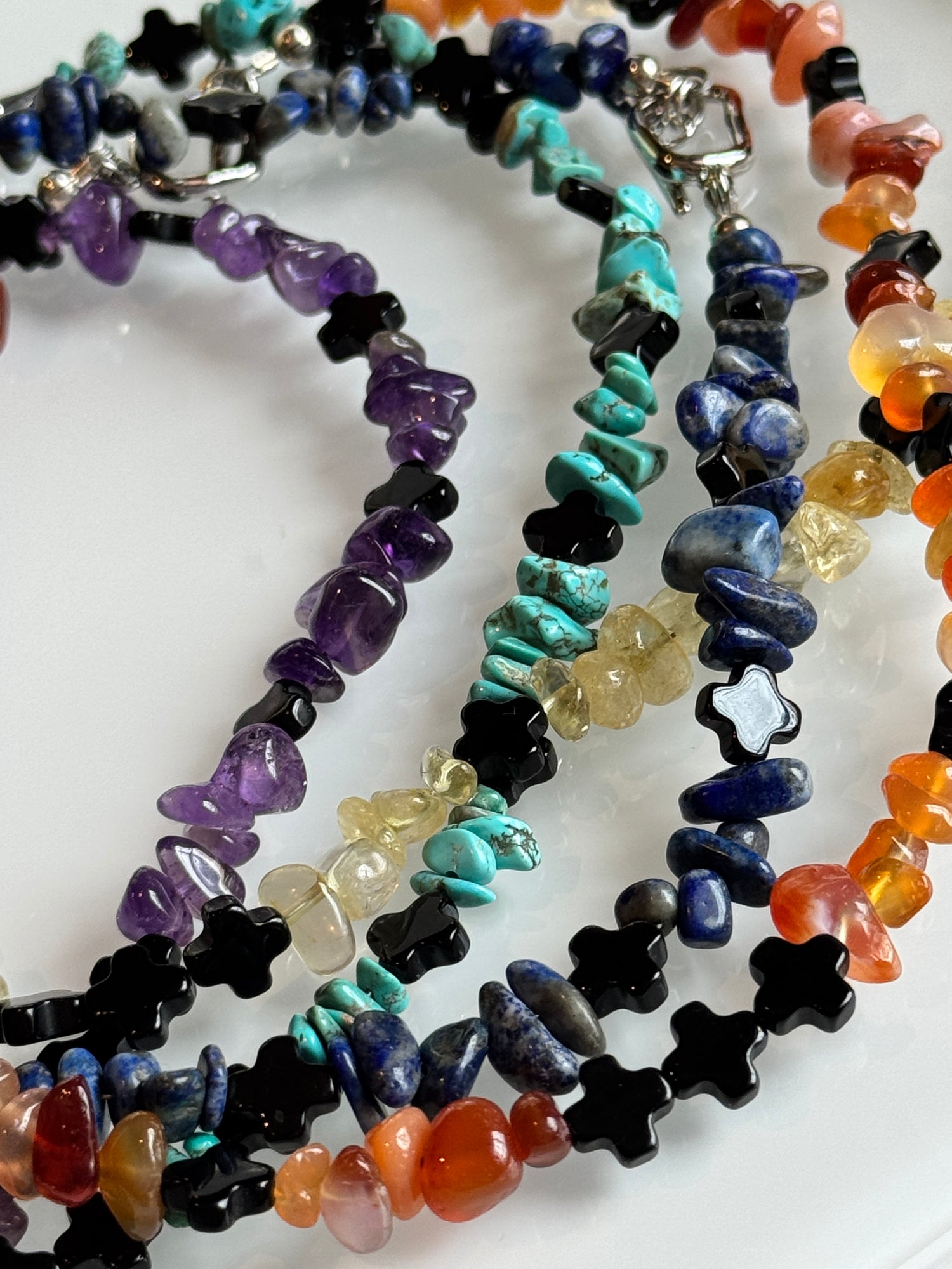 colorful summer collection of turquoise, citrine, carnelian, onyx, lapis lazuli and amethyst authentic crystals