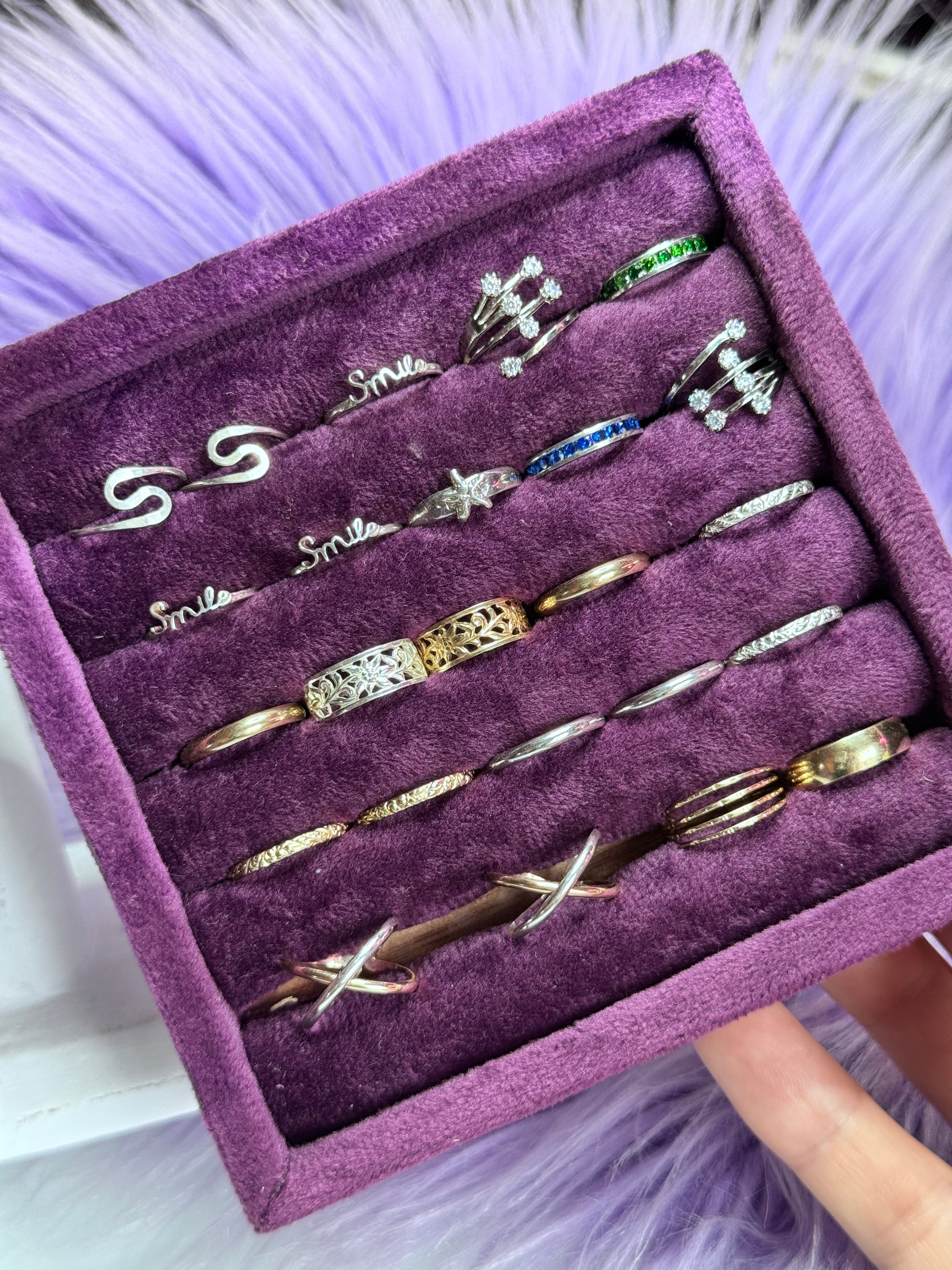toe rings in gold and silver on purple display